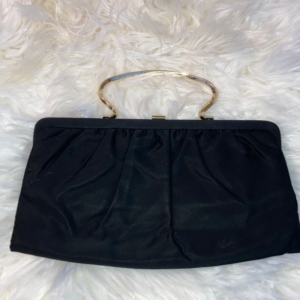 BOBBIE JEROME blk evening bag, sz. on pics, 1 spot, gold handle option. $15